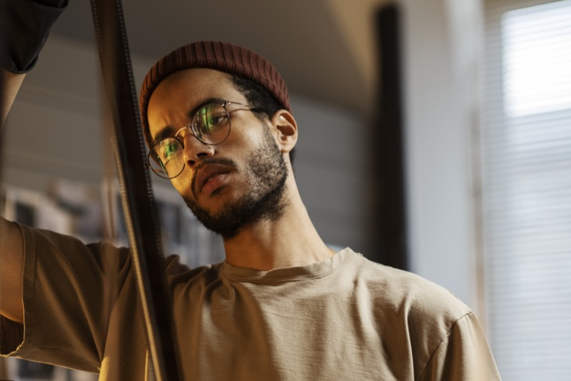Man wearing thin wireframe round glasses