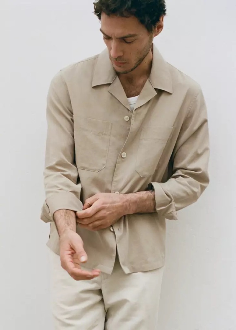 Pierre-Benoit wears a stone camp-collar overshirt with cream trousers