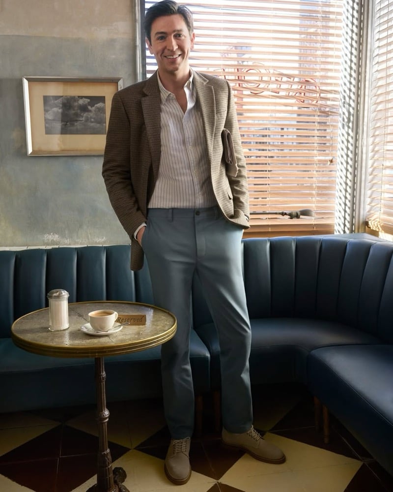 Braun wears Bonobos chinos with a striped shirt and tweed blazer