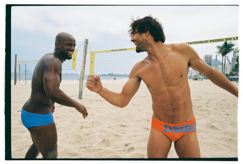 Geremias and Marlon face off on a Rio beach volleyball court, one in plain blue Dsquared2 swim briefs and the other in orange briefs