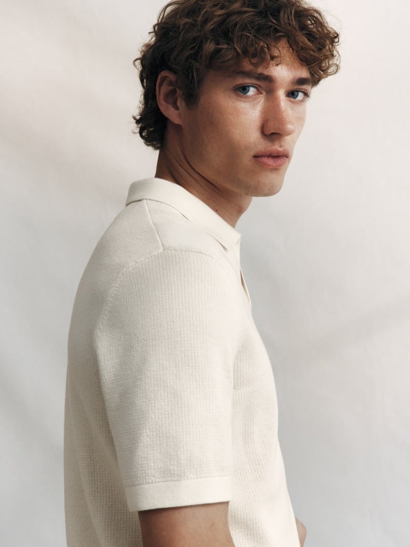 Profile portrait of Valentin Humbroich in a cream waffle-knit short-sleeve polo