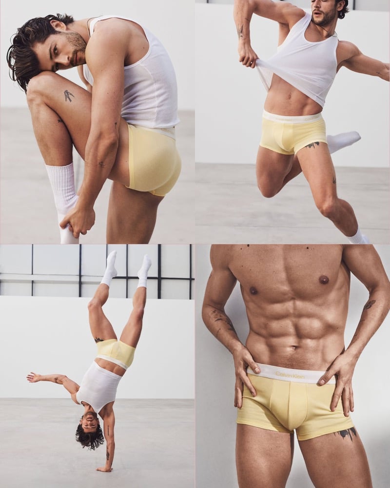 A four-frame grid of Sam Salter in pale yellow Calvin Klein Pride trunks and white socks: stretching forward into his calf, mid-leap pulling up a white tank top, in a one-handed handstand with his hair swept down, and in a cropped torso shot with both hands at his hips