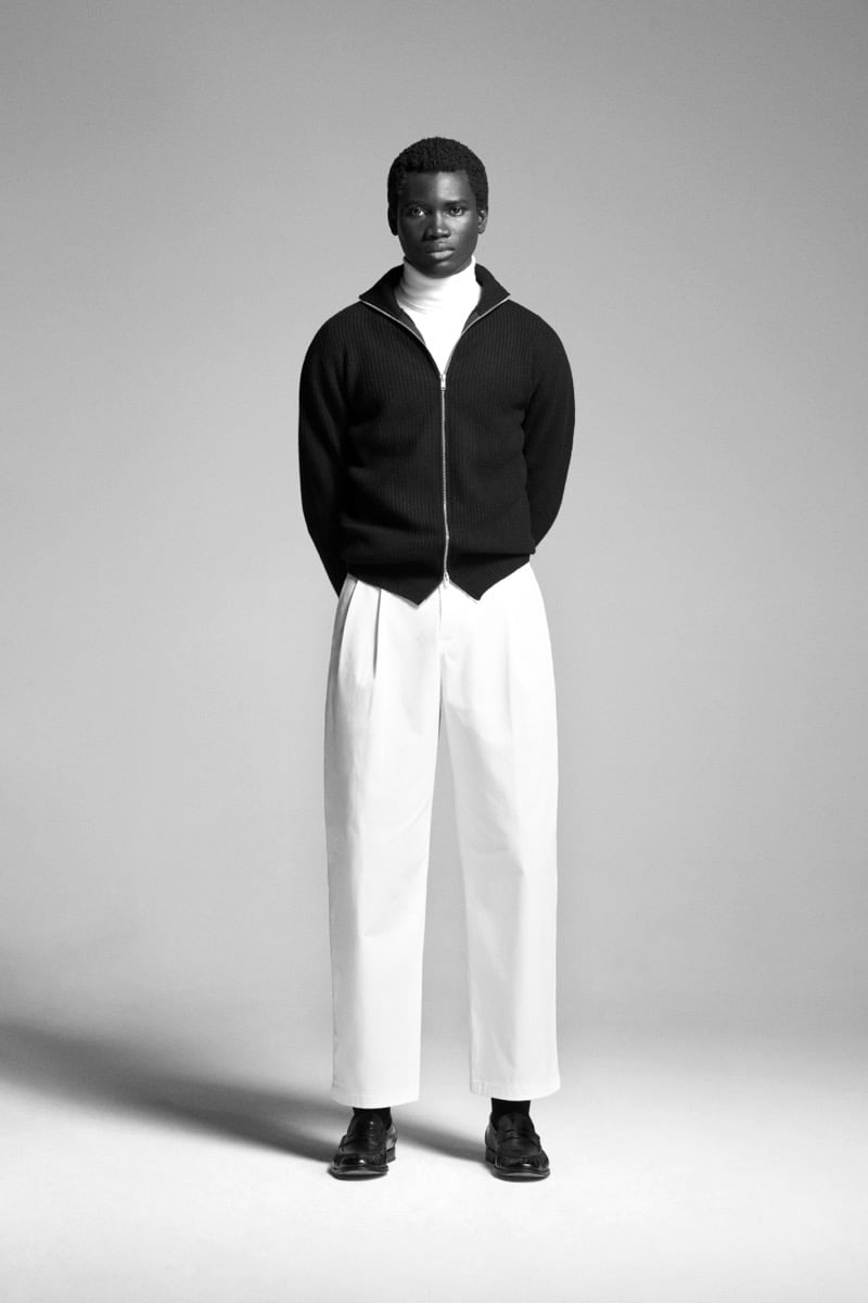 Alexander Acquah wears the John Smedley Mallam eco cashmere zip-front jacket over a turtleneck with cropped wide-leg trousers
