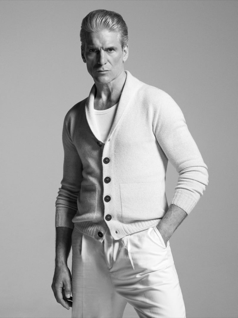 Close-up portrait of Felix Friedman in the John Smedley Rockford eco cashmere shawl-collar cardigan worn over a knit tee