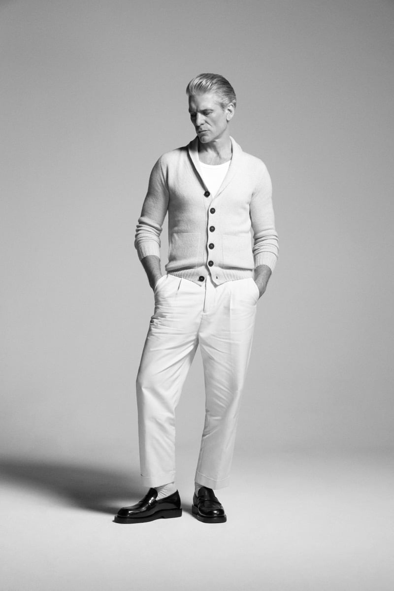 Felix Friedman wears the John Smedley Rockford eco cashmere shawl-collar cardigan over a t-shirt with pleated trousers and loafers