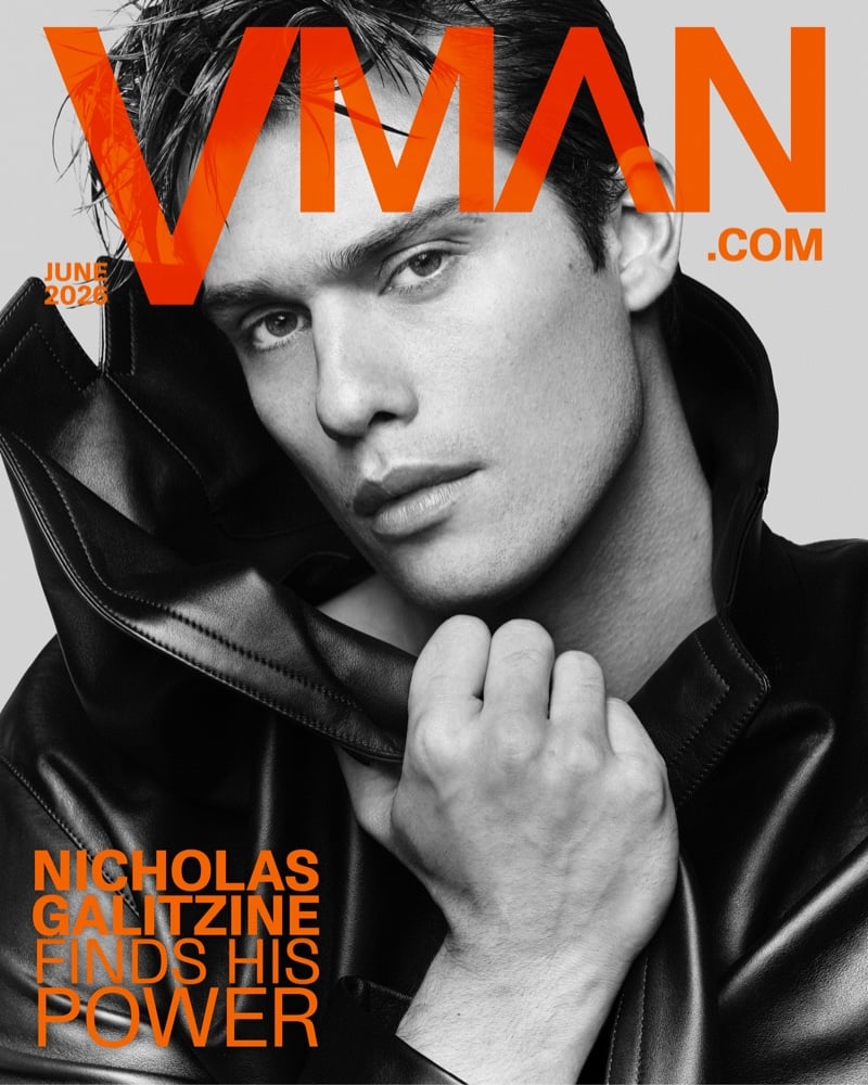 Nicholas Galitzine wears a Hermès black leather coat with the collar pulled high beside his face on the VMAN June 2026 digital cover