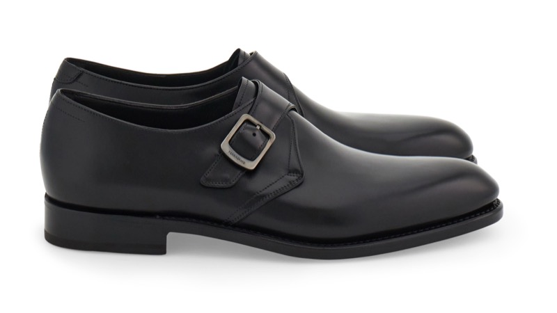 Ferragamo Tramezza black leather single monk-strap shoe with a silver buckle, shown in profile