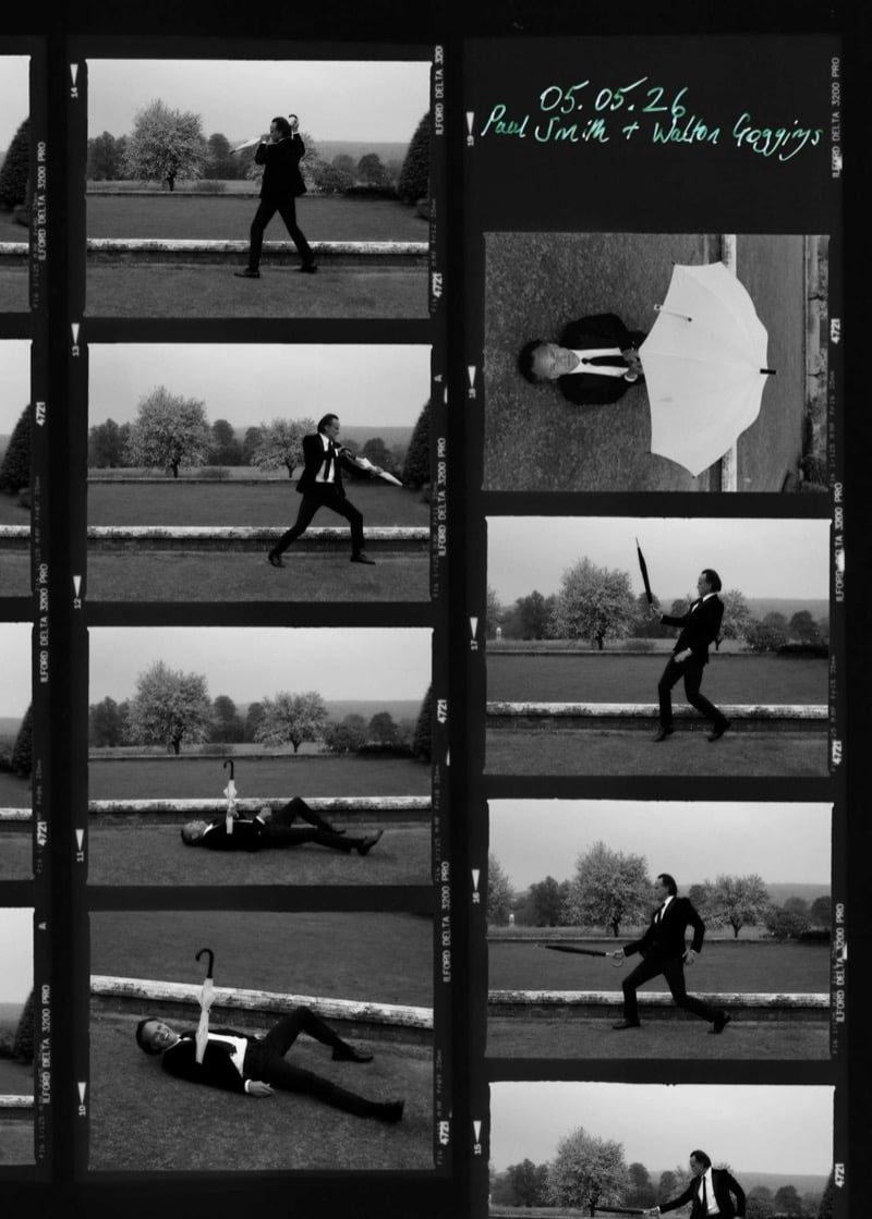 Black and white contact sheet of Walton Goggins in evening tailoring sparring with an open umbrella across the lawns of an English estate, the corner inscribed 05.05.26 Paul Smith + Walton Goggins