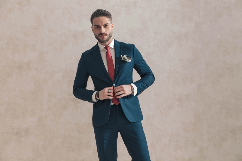 Blue suit red tie