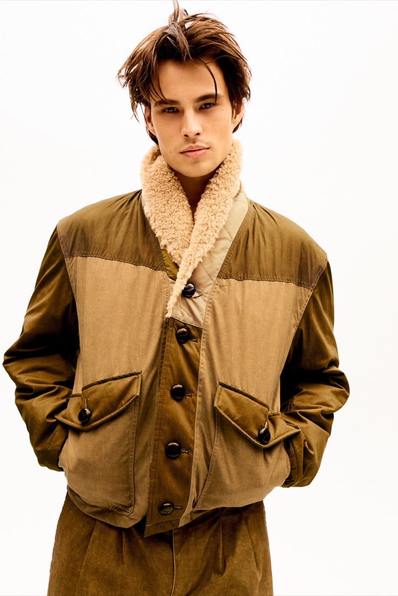 Louis Baines in a tan shearling-collar jacket and matching corduroy trousers, for Isabel Marant Fall 2026