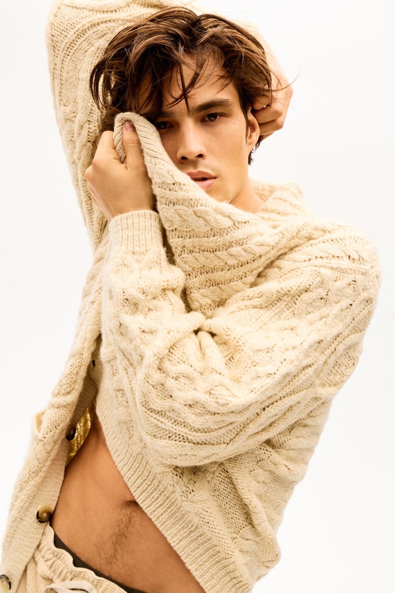 Louis Baines in a chunky cable-knit cardigan, for Isabel Marant Fall 2026