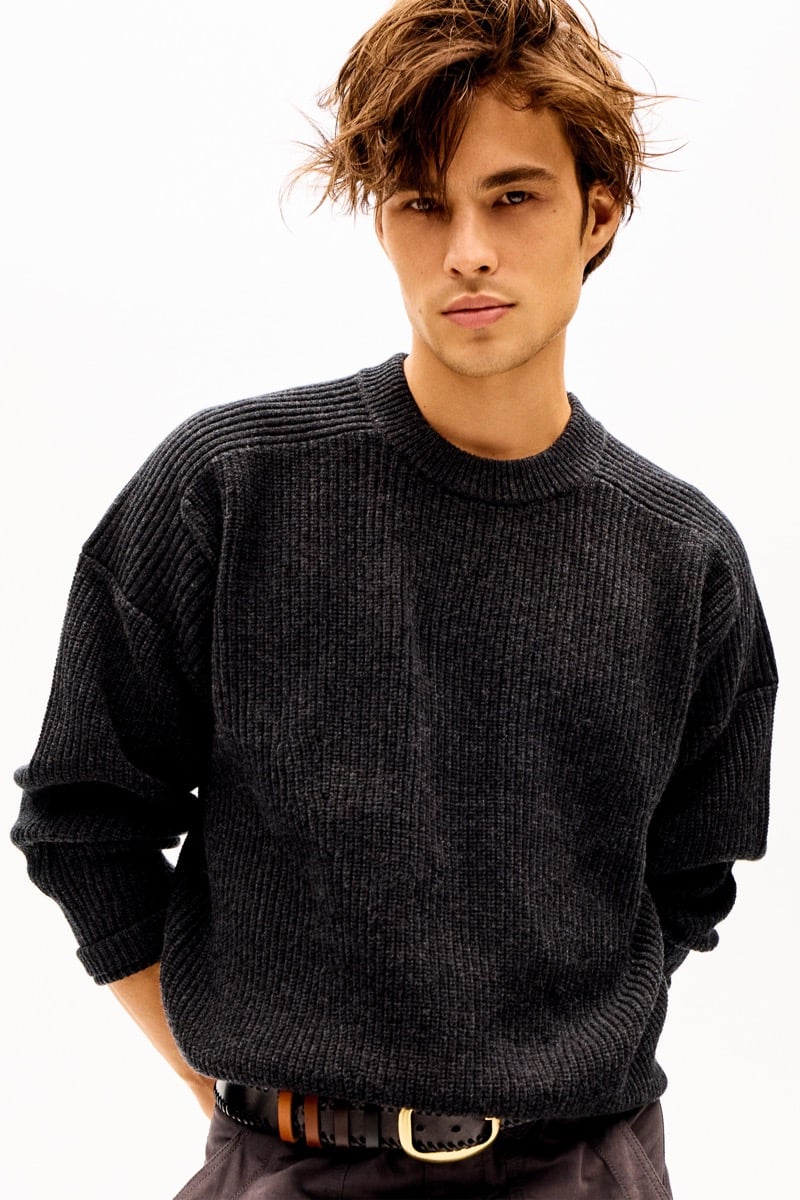 Louis Baines in a chunky ribbed sweater, for Isabel Marant Fall 2026