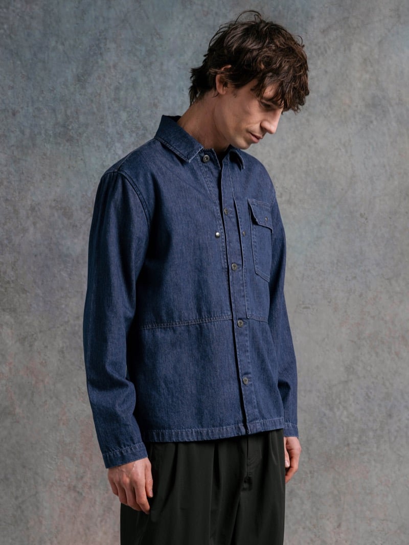 Man in a blue denim shirt-jacket, for Kestin Fall 2026