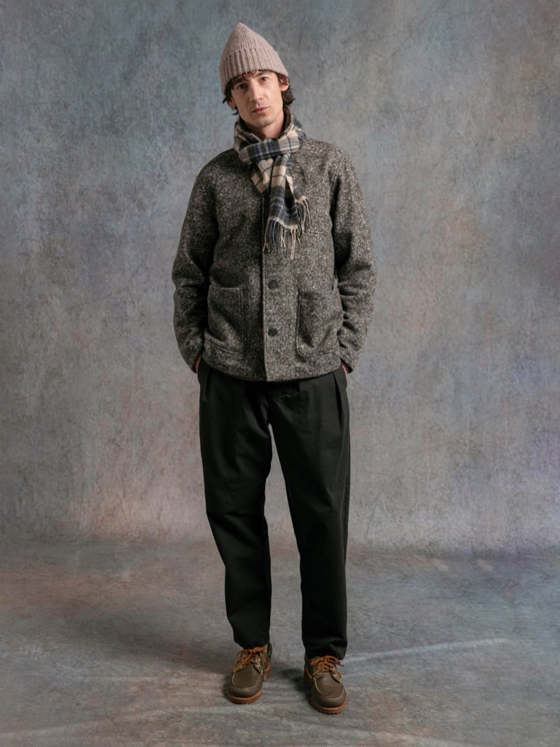 Man in a gray wool jacket with a plaid scarf, wearing a beanie, for Kestin Fall 2026