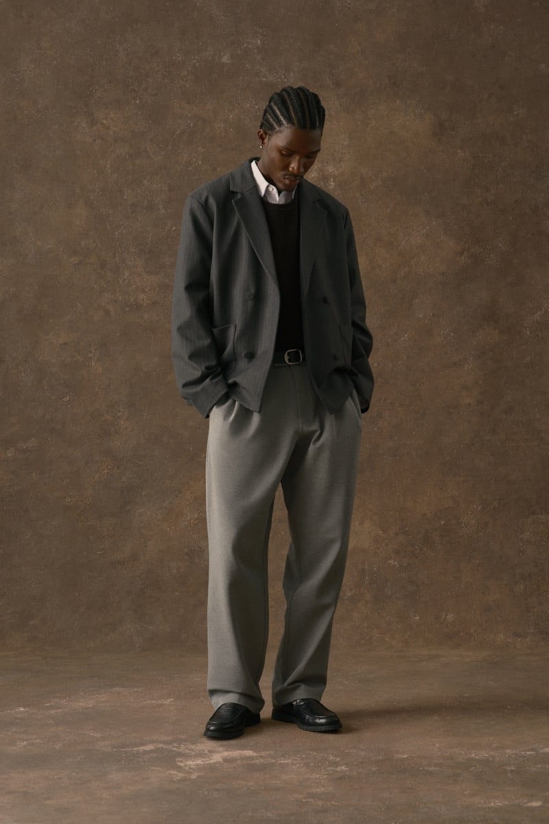 Man in a gray double-breasted blazer over a dark sweater, for Kith Fall 2026