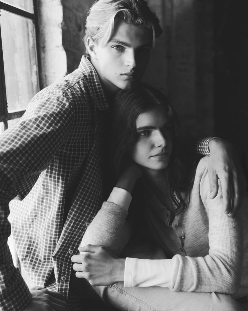 Black and white close-up of Maurits Scheij and Maya Gunn embracing