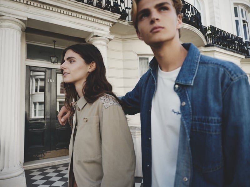 Maurits Scheij and Maya Gunn walking past a London townhouse entrance