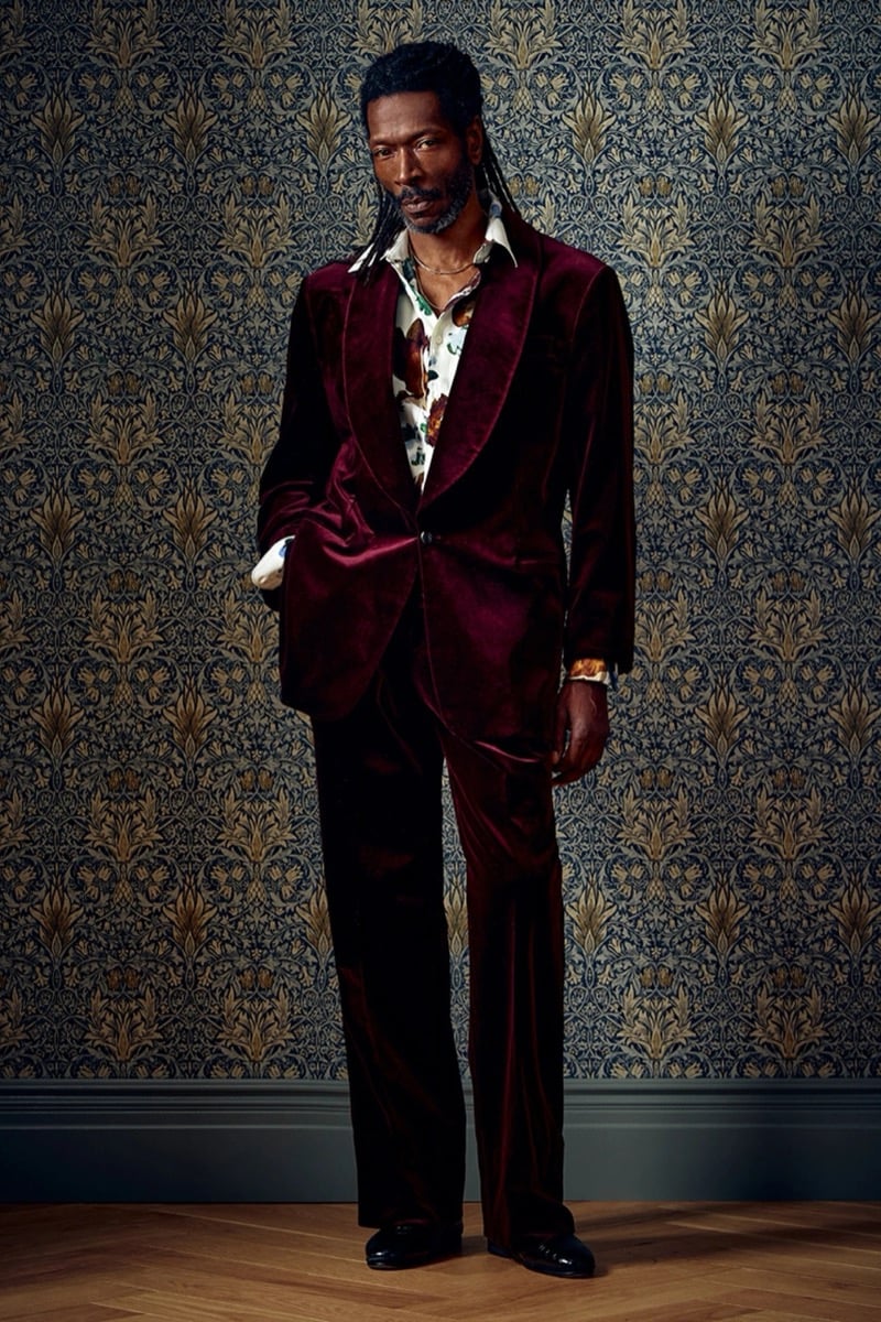 Man in a burgundy velvet suit and a floral shirt, for Todd Snyder Fall 2026