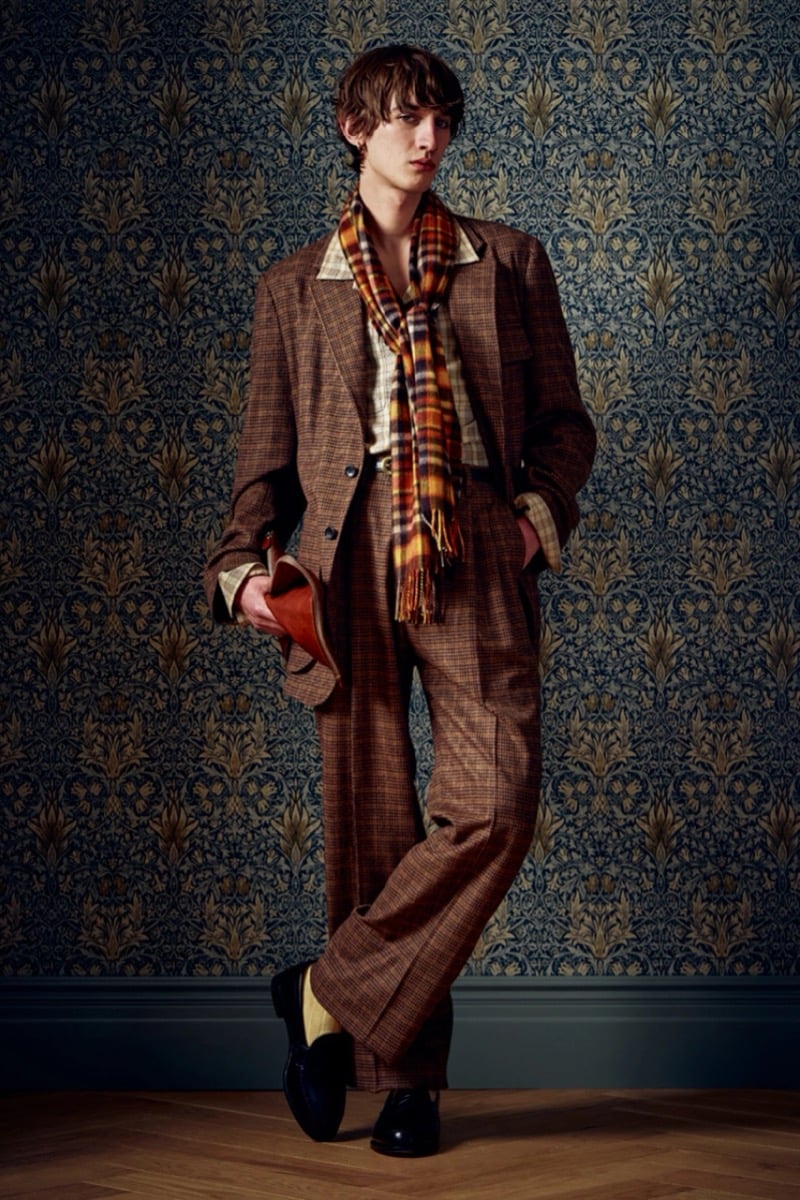 Man in a brown plaid suit with a plaid scarf, for Todd Snyder Fall 2026