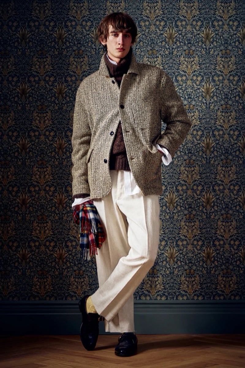 Man in a herringbone wool jacket over a dark turtleneck and light-colored trousers, for Todd Snyder Fall 2026