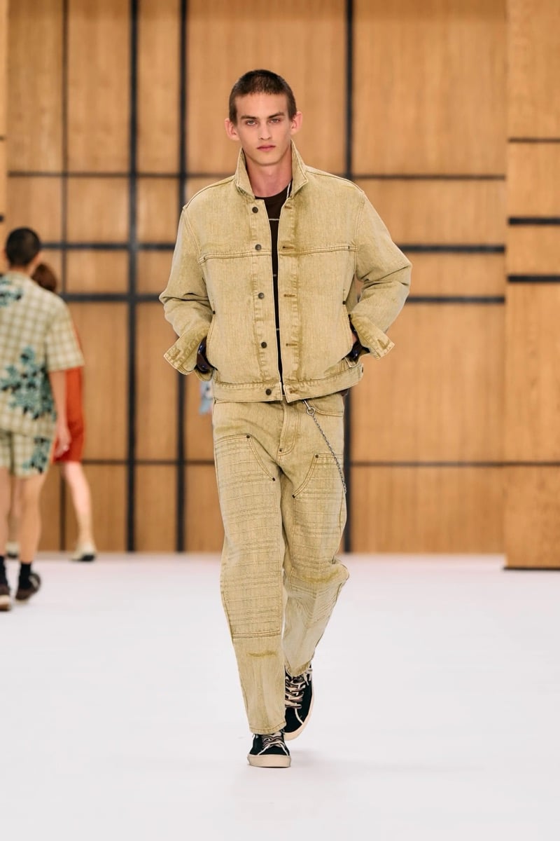 A model in a washed denim jacket and matching jeans, for Burberry's summer 2027 collection