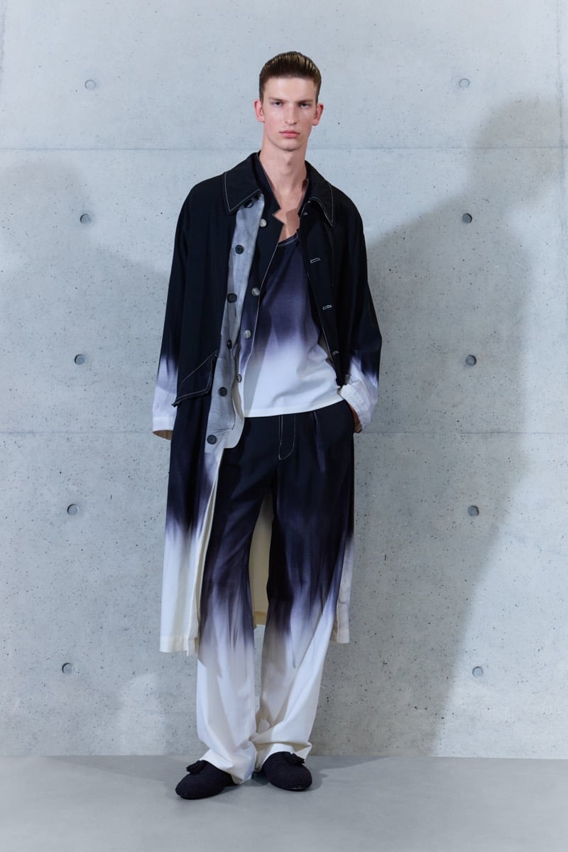 A model in a gradient-dyed coat, top, and trousers, for Emporio Armani's spring-summer 2027 collection