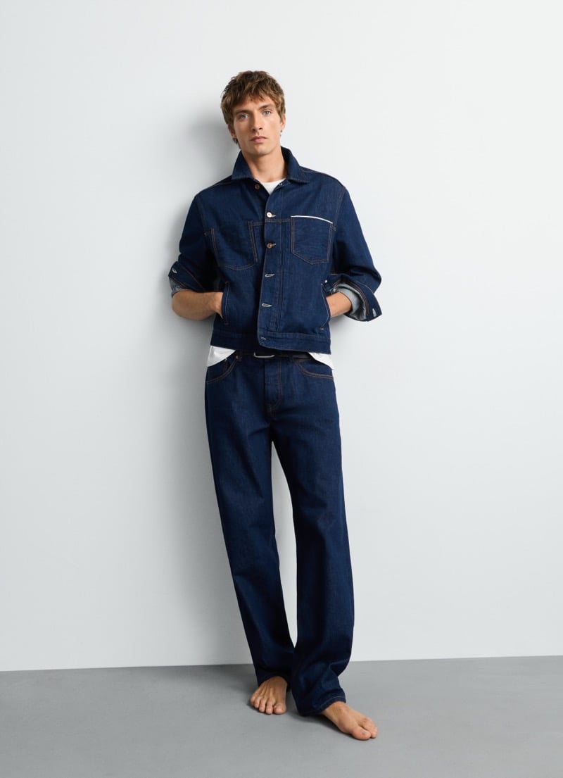Samuel Curtis stands barefoot in Pepe Jeans' selvedge trucker jacket and straight-leg Dalston jean for the Italian Selvedge capsule