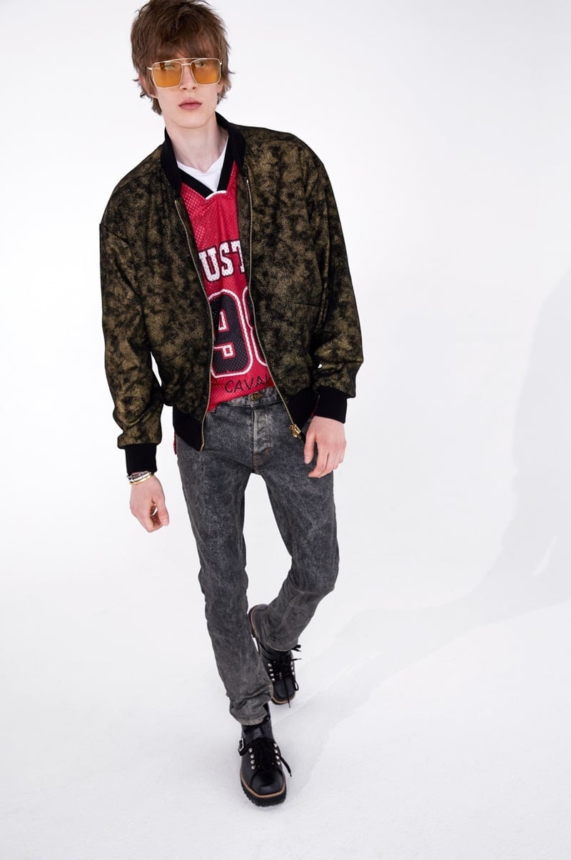 Just Cavalli spring 2019 look with a basketball jersey, printed jacket, skinny jeans and buckled boots.