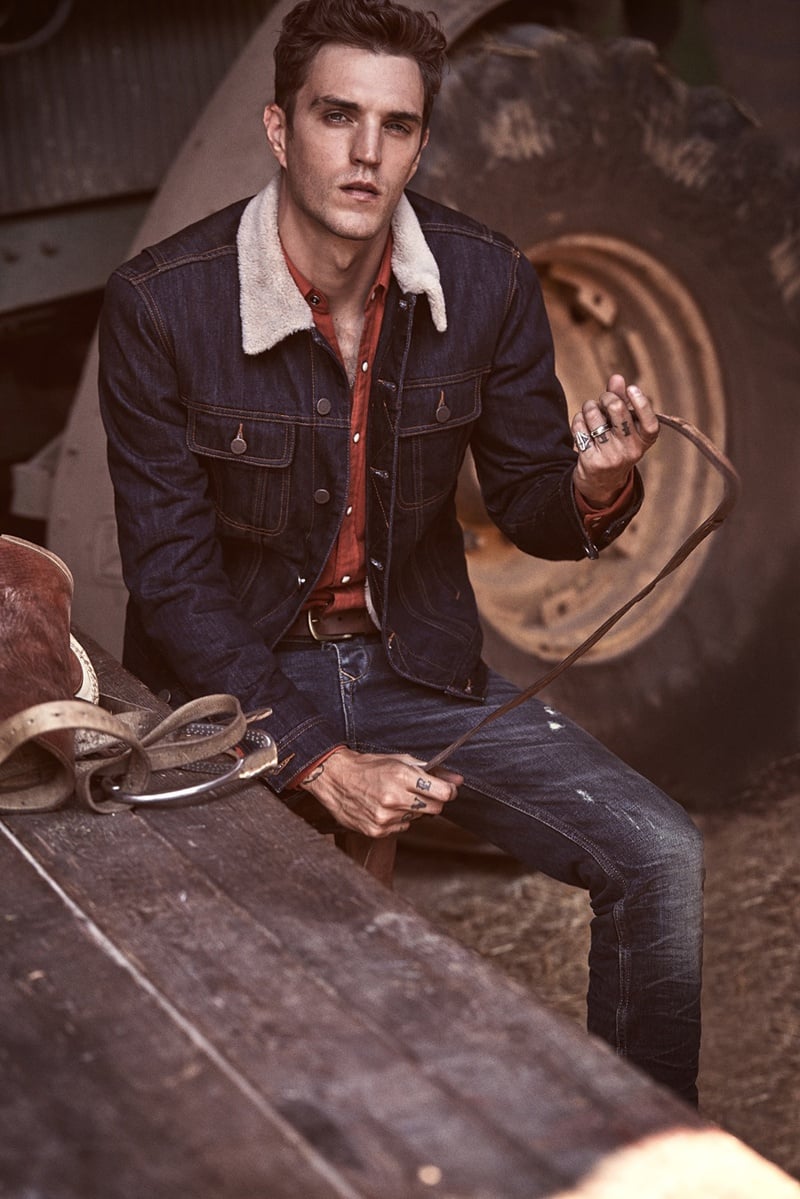 Josh Beech wears a contrast-collared denim jacket and red shirt for Mango Man Blacksmith winter 2015.