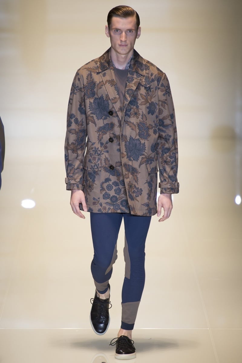 Gucci spring 2014 runway look with geometric leggings, a floral coat and lace-up shoes.