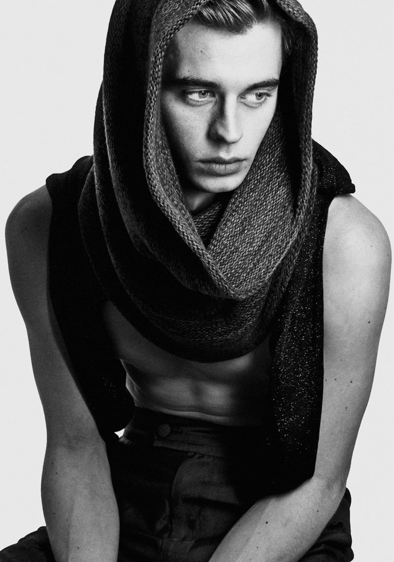 Nick Radley wears a COS snood pulled over his head in a black-and-white 2013 portrait.