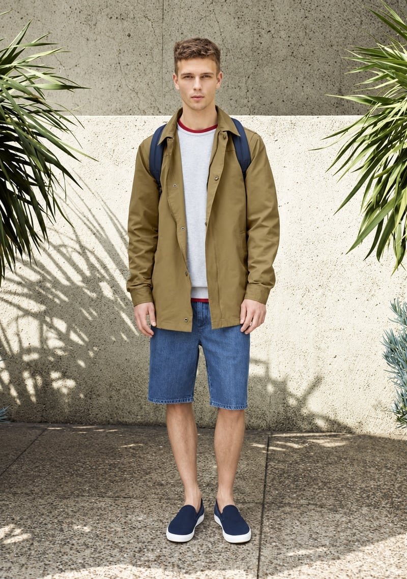 Benjamin Eidem wears an overshirt, denim shorts, slip-ons and a backpack for Pull & Bear spring 2015.