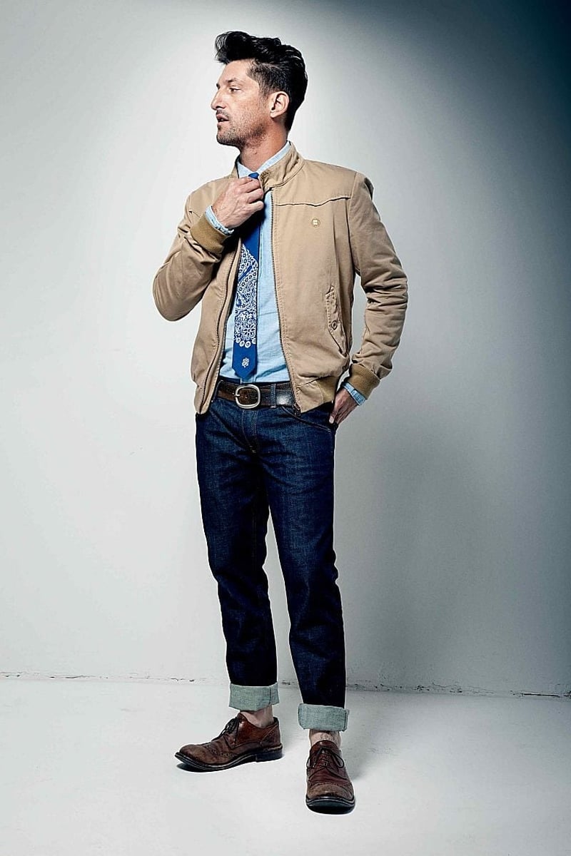 Tony Ward wears Wrangler Blue Bell denim with a shirt and tie for spring 2010.