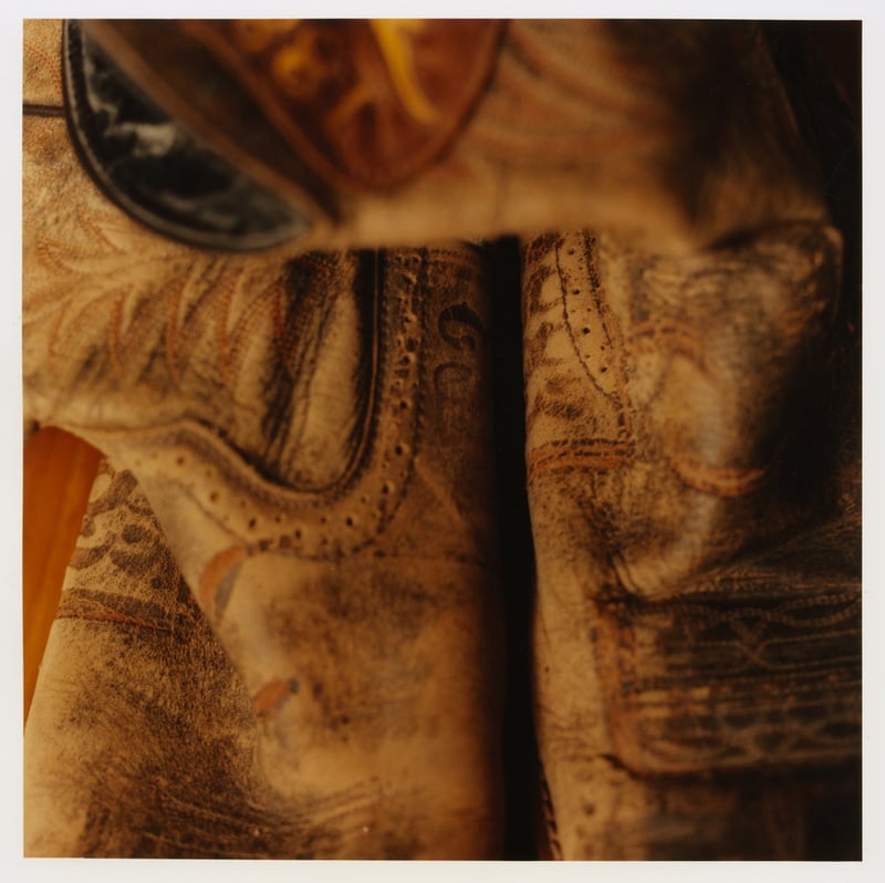 Close-up of decorative stitching on a cowboy boot.