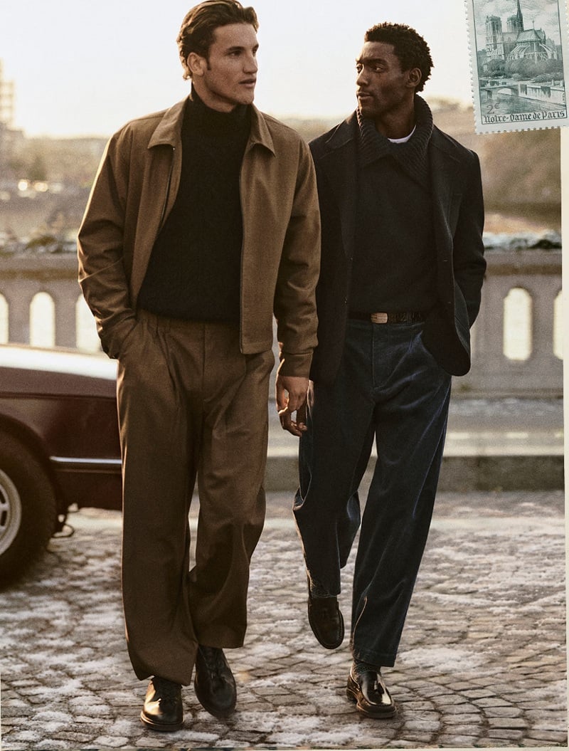 Max Knott and Halid Nuhu walk in Paris wearing tailored jackets and high-neck knits.