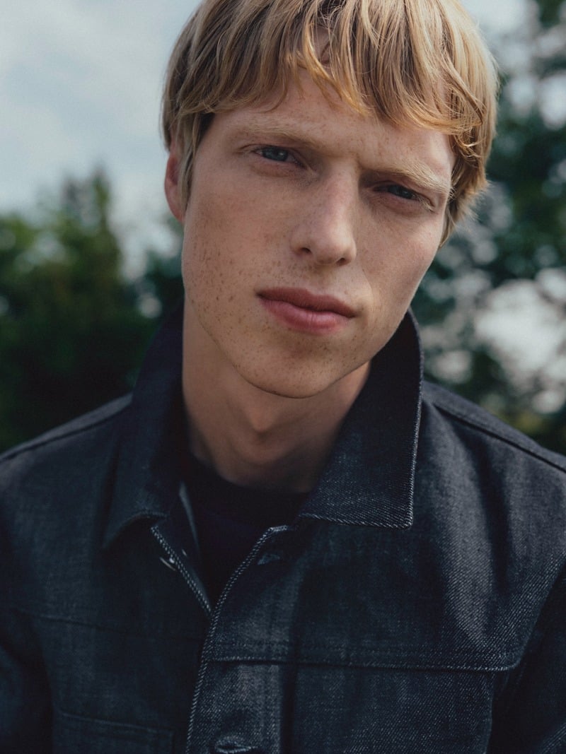 Joseph Uyttenhove wearing a dark denim jacket in the Barbour x A.P.C. fall 2026 campaign.