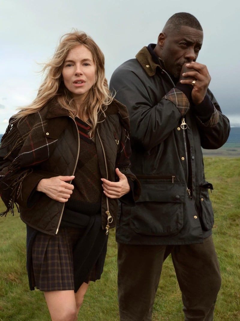Sienna Miller and Idris Elba wear Barbour outerwear and tartan in the Scottish countryside.