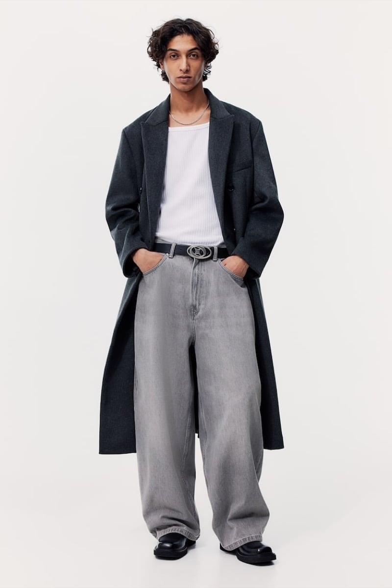 Nizar Talal wears H&M’s Collins super-baggy jeans beneath a long coat.