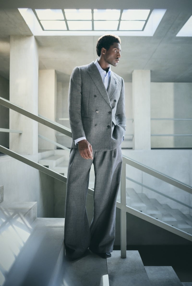 A double-breasted suit with wide trousers in Mytheresa’s fall 2024 office edit shows how a fuller silhouette can retain formal conventions.