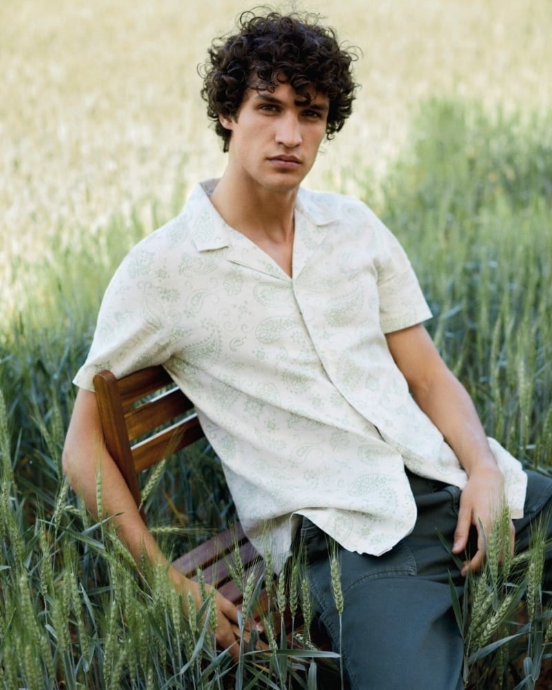 Francisco Henriques wears a pale paisley Cuban-collar shirt from Pepe Jeans’ pre-fall 2023 collection.