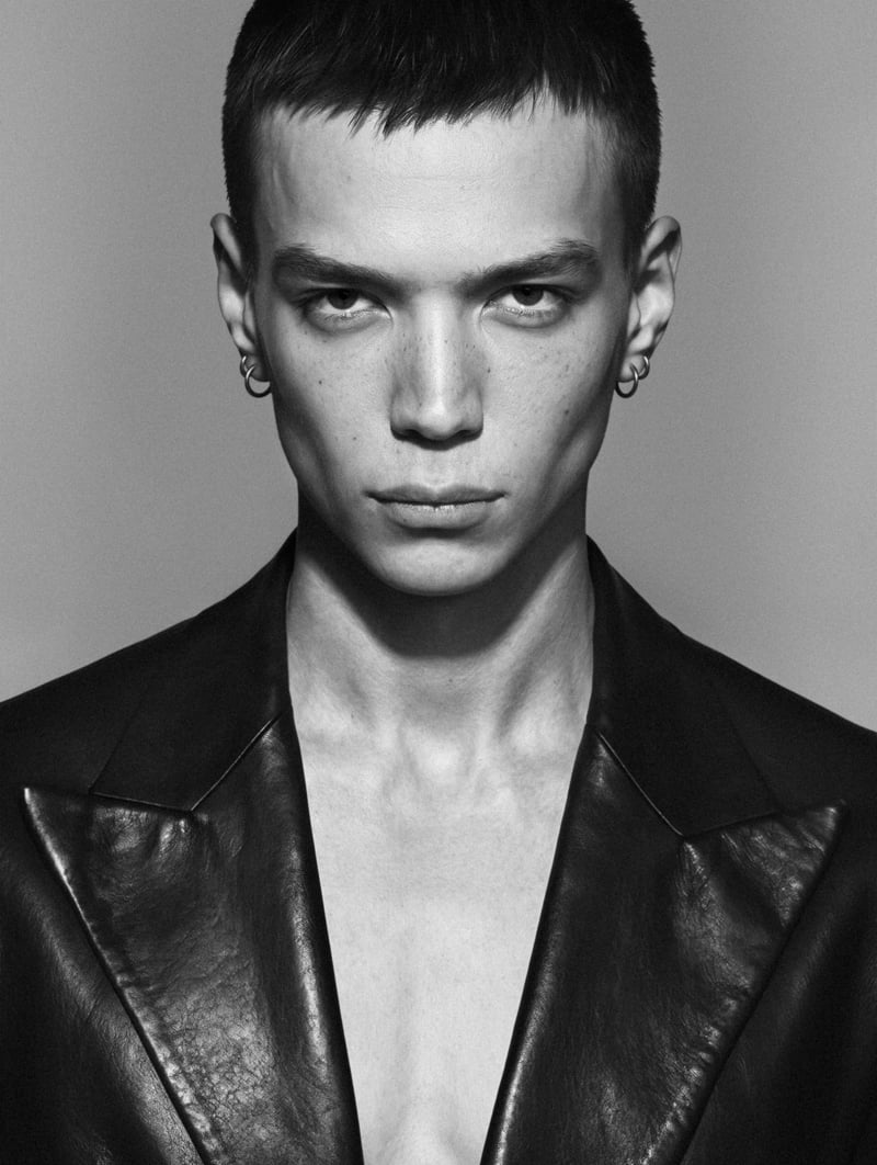 Sasha Profatilov wears a Saint Laurent by Anthony Vaccarello jacket and his own earrings.