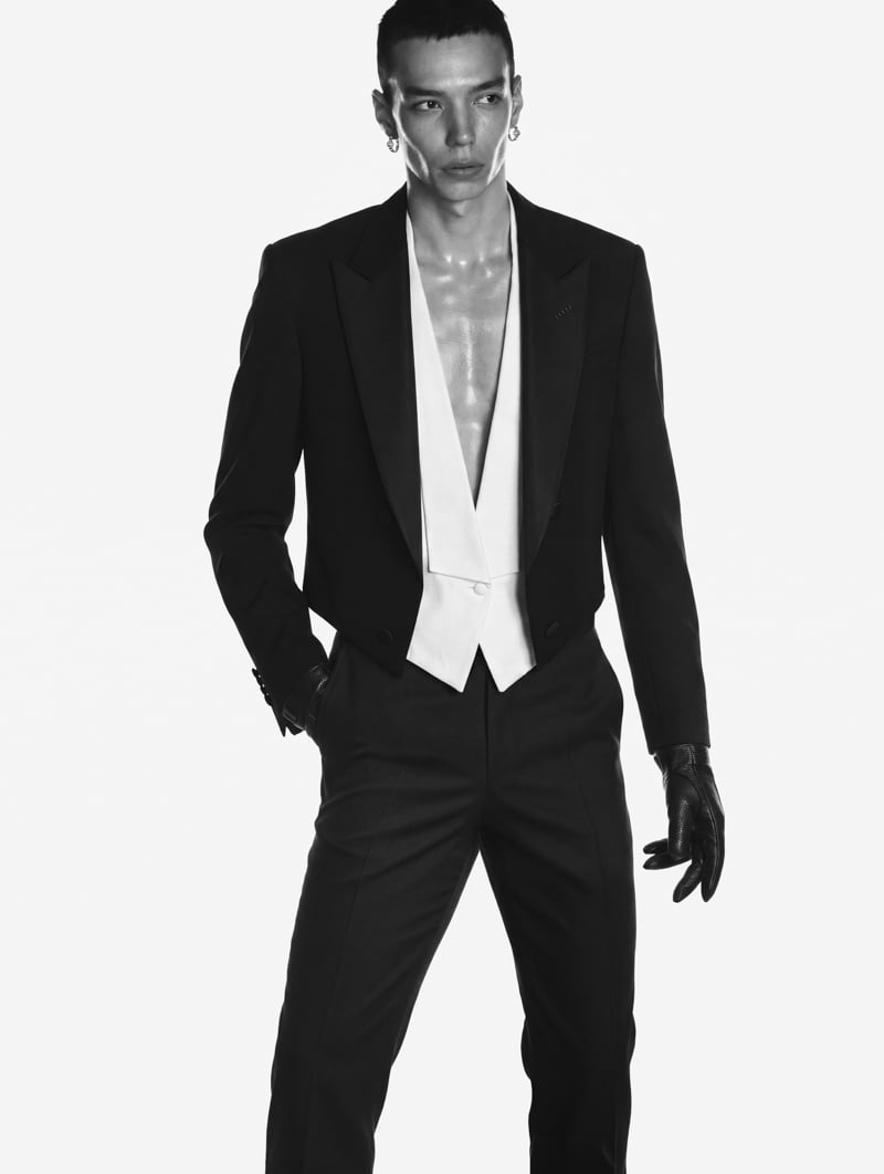 Sasha Profatilov wears a Tom Ford look with Gucci earrings and gloves.