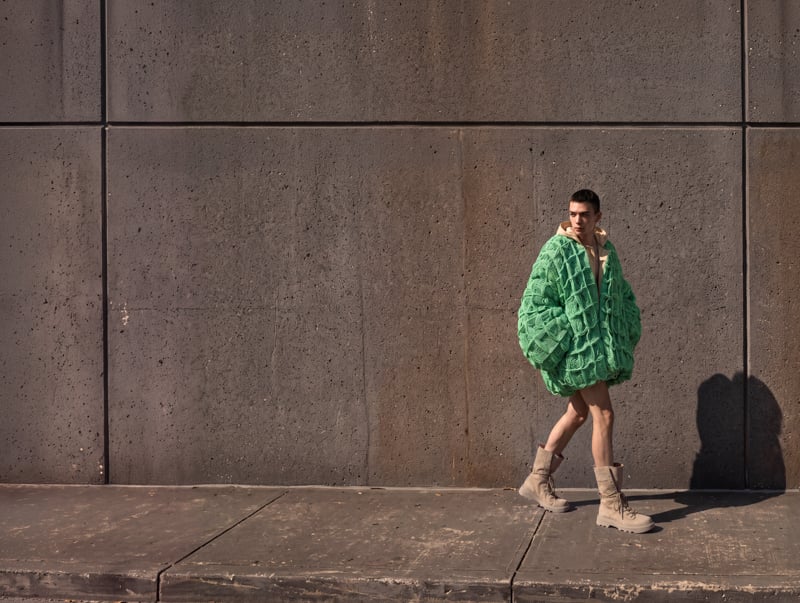 Sasha Profatilov steps out in an oversized green knit look by JW Anderson.