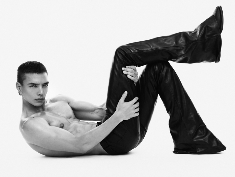 Sasha Profatilov reclines in Rick Owens trousers, Alan Crocetti jewelry, and Eytys boots.