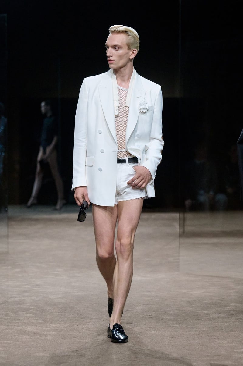 A model wears pale jacket with white briefs and loafers on the Tom Ford spring-summer 2027 runway.