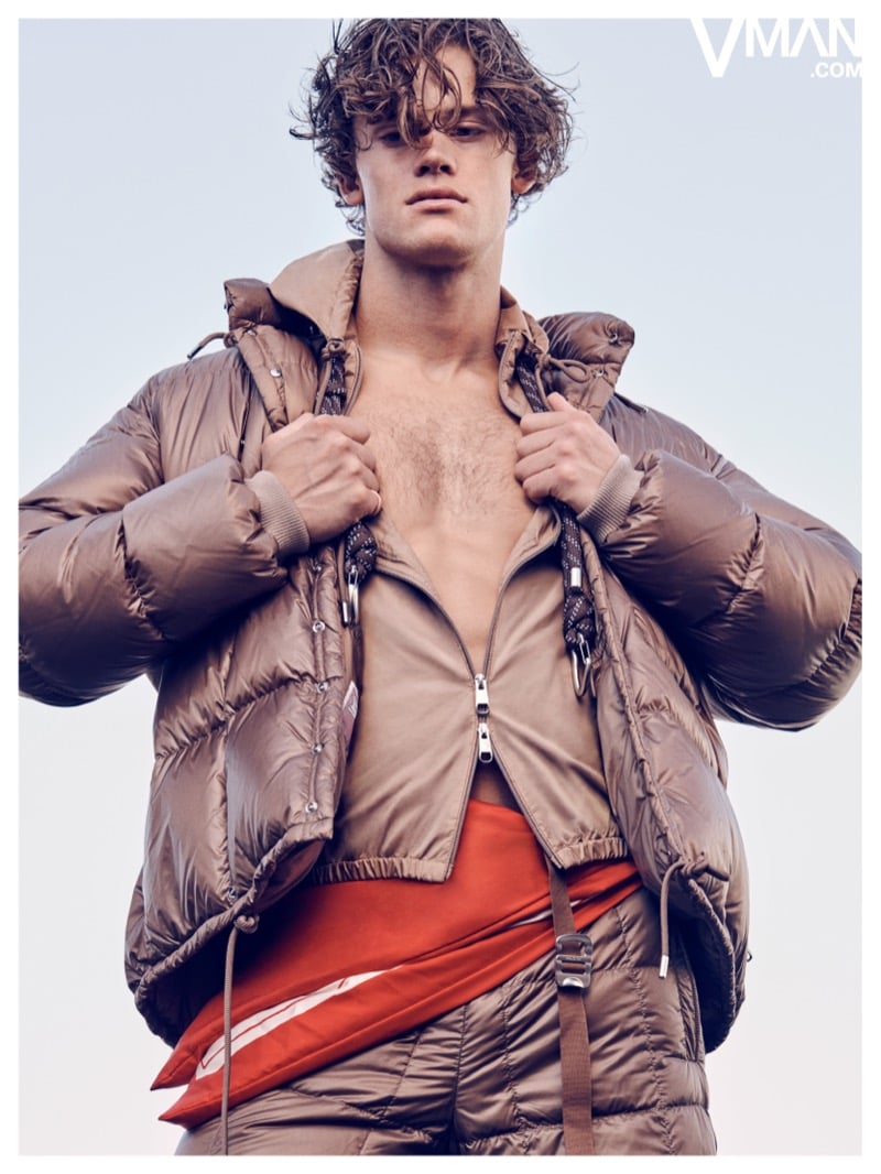 Lucas Pinheiro Braathen opens a taupe Moncler puffer jacket over matching layers.