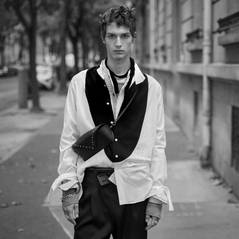 Leonard Kipker wears an asymmetric waistcoat over a long shirt with loose trousers for Zara Studio's fall-winter 2026 campaign
