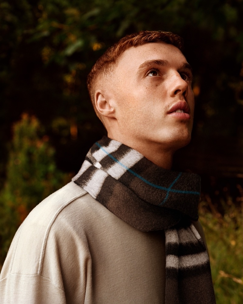 Cole Palmer wears Burberry’s check cashmere scarf in snug.